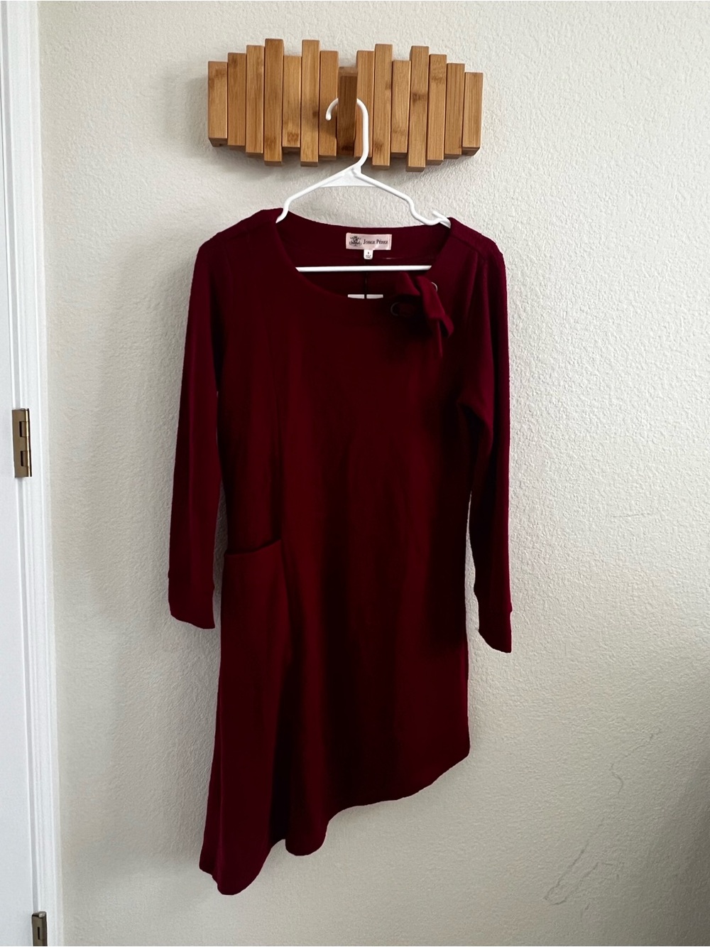 Jorge Pérez Women's Burgundy Asymmetrical Dress with Bow Accent